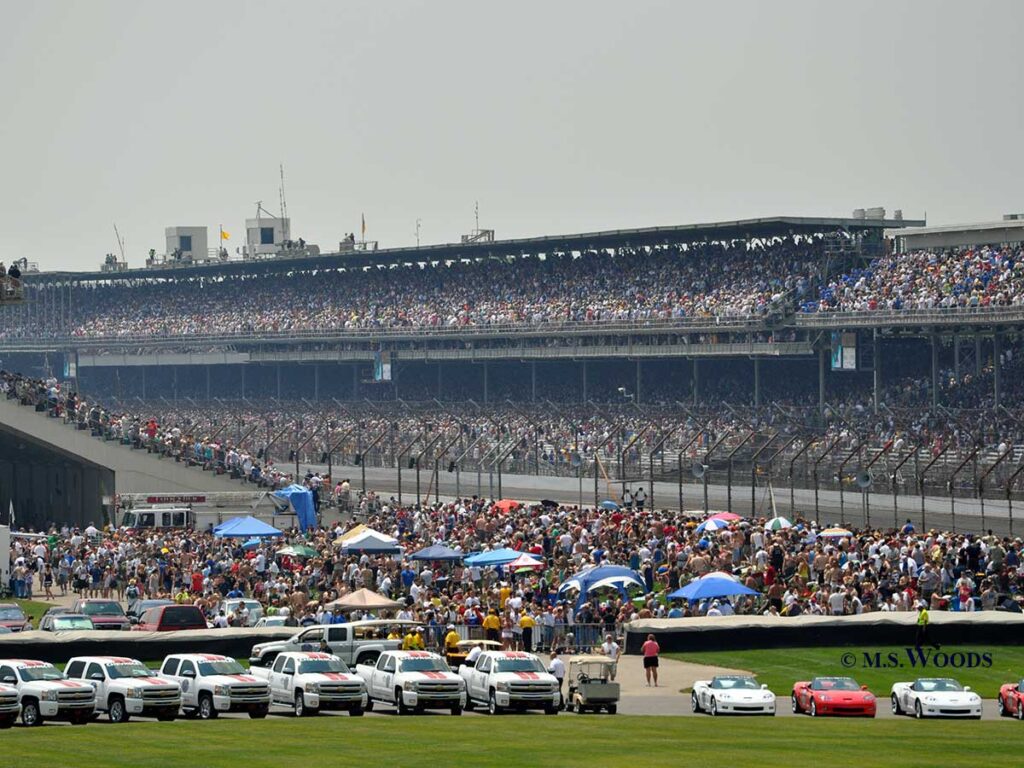 Crowd both seated and standing in the infield for the Indianapolis 500-mile race in Indianapolis, Indiana