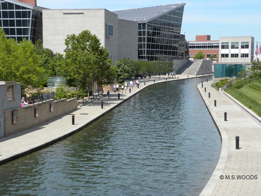 Canal view of the Indiana State Museum from White River Canal Walk in downtown Indianapolis, Indiana