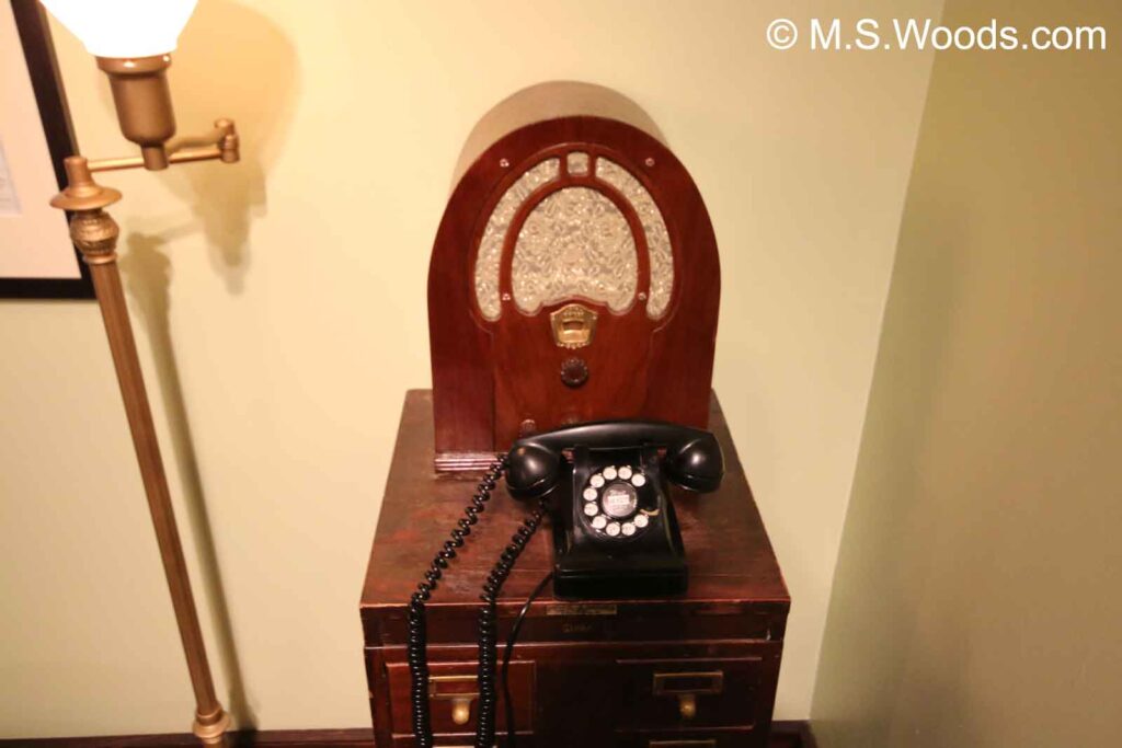Old radio, old phone, and an old nightstand at the Eugene and Marilyn Glick Indiana History Center in Indianapolis, Indiana