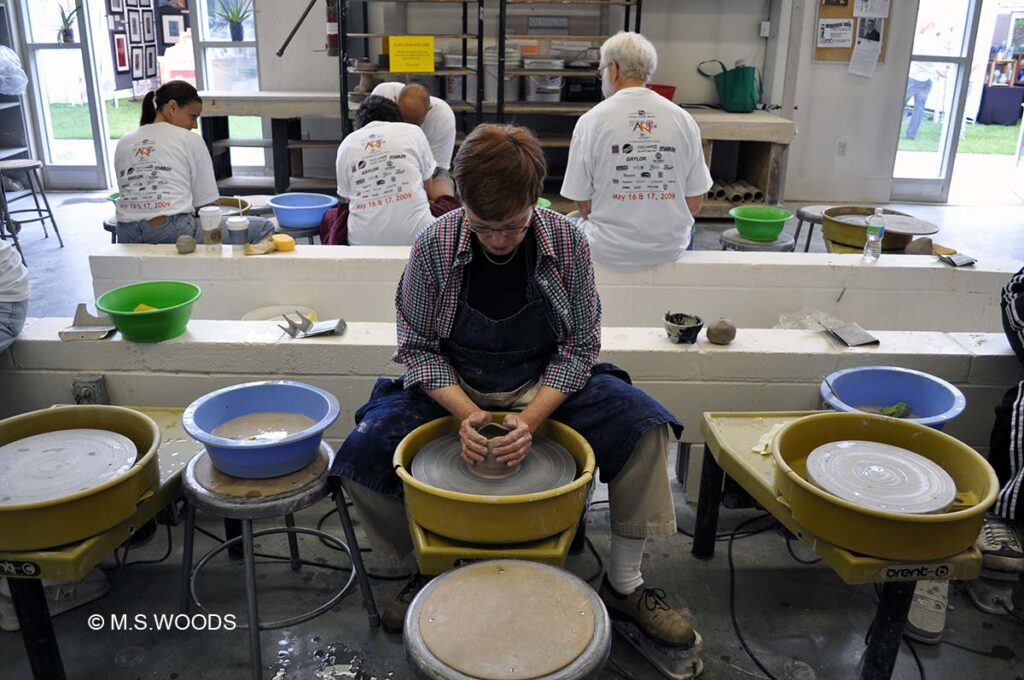 Man, pottery spinning at the Indianapolis Art Center in Broad Ripple Indianapolis, Indiana