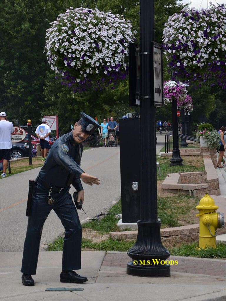 Statue of a policeman directing traffic in Carmel, Indiana
