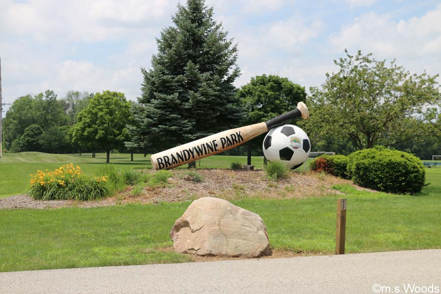 Baseball bat and soccer ball entrance to the Brandywine Park in Greenfield, Indiana