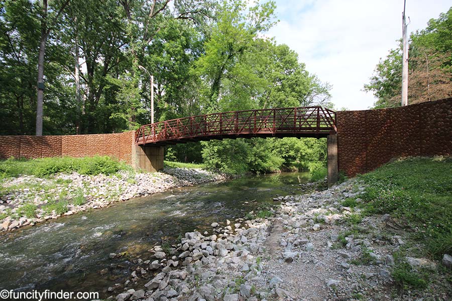 View of the bridge over a creek in Arbuckle Acres Park in Brownsburg, Indiana