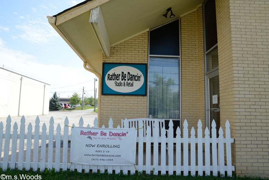 White picket fence and entry to Rather be Dancin' in Westfield, Indiana